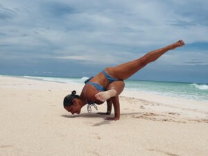 Be Flexible - Flexing on the beacch doing yoga