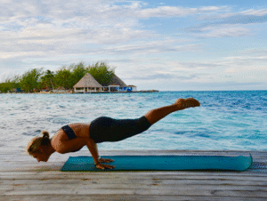 Impermanence yoga stand on the pier